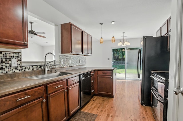 3904 Clydesdale Dr, Columbia, MO 65202 - kitchen featuring electric range oven, dishwasher, light wood-style flooring, tasteful backsplash, and hanging light fixtures