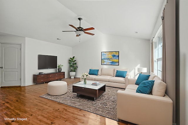 3904 Clydesdale Dr, Columbia, MO 65202 - living area featuring vaulted ceiling, wood finished floors, and a ceiling fan