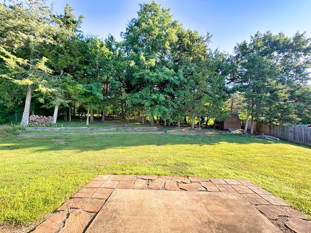 3904 Clydesdale Dr, Columbia, MO 65202 - fenced backyard featuring a storage shed and a patio area