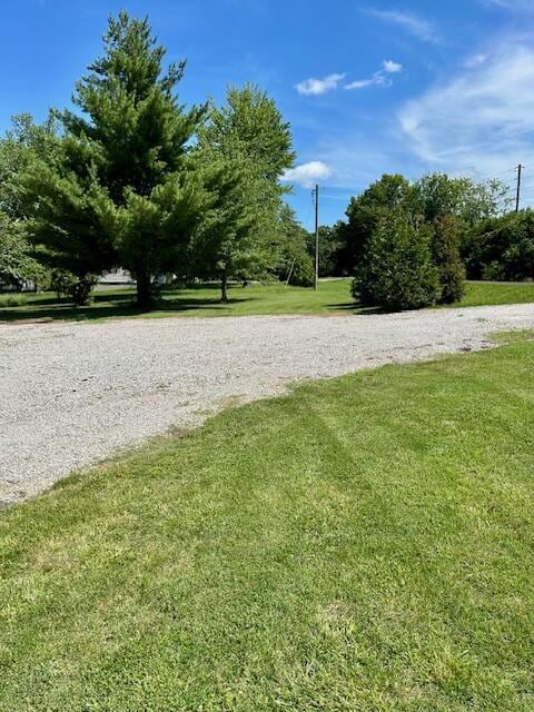 9855 N Route E, Harrisburg, MO 65256 - view of home's community featuring a lawn