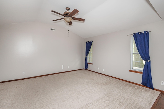 9855 N Route E, Harrisburg, MO 65256 - carpeted empty room featuring lofted ceiling and a ceiling fan