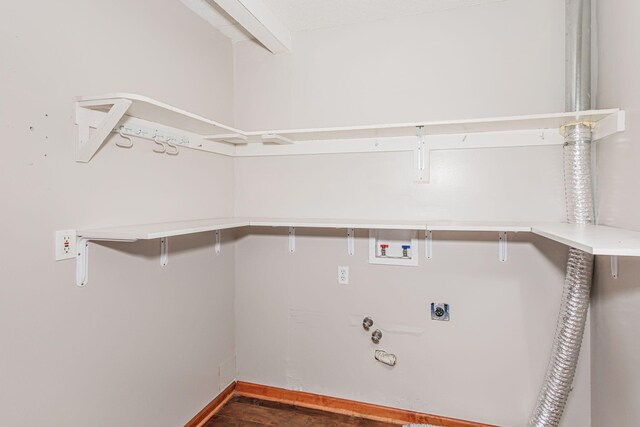 9855 N Route E, Harrisburg, MO 65256 - laundry room with hookup for an electric dryer, hookup for a washing machine, hookup for a gas dryer, and dark wood-style flooring