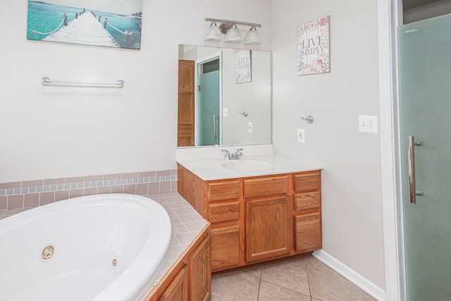 9855 N Route E, Harrisburg, MO 65256 - bathroom featuring vanity, a whirlpool tub, and tile patterned floors