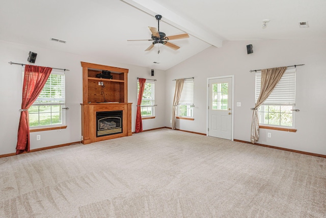 9855 N Route E, Harrisburg, MO 65256 - unfurnished living room with carpet flooring, ceiling fan, and a glass covered fireplace