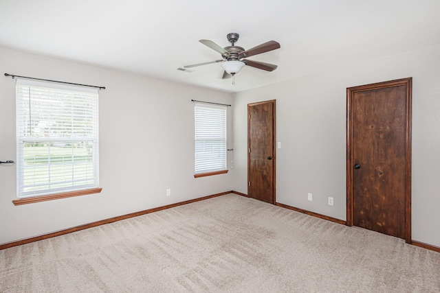 9855 N Route E, Harrisburg, MO 65256 - unfurnished bedroom featuring carpet flooring and a ceiling fan