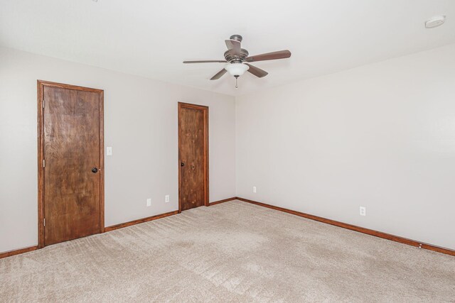 9855 N Route E, Harrisburg, MO 65256 - unfurnished room featuring carpet floors, a ceiling fan, and a smoke detector