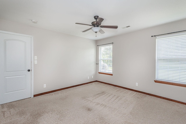 9855 N Route E, Harrisburg, MO 65256 - carpeted spare room featuring a ceiling fan and a smoke detector