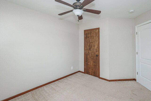 9855 N Route E, Harrisburg, MO 65256 - unfurnished bedroom with carpet, ceiling fan, and a closet