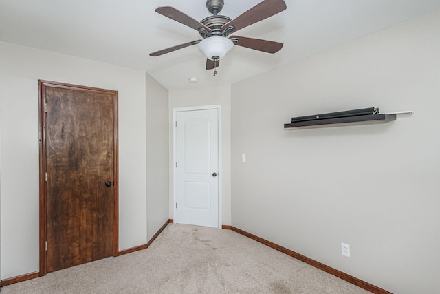 9855 N Route E, Harrisburg, MO 65256 - unfurnished bedroom featuring carpet, ceiling fan, and a closet