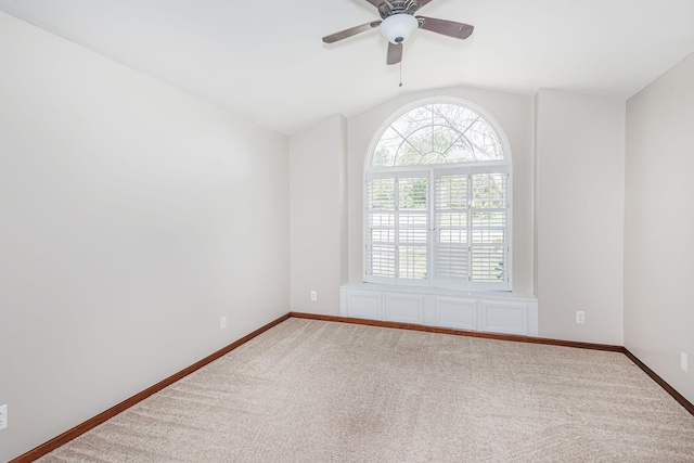 9855 N Route E, Harrisburg, MO 65256 - empty room featuring lofted ceiling, ceiling fan, and carpet floors
