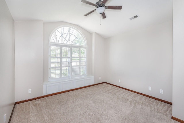 9855 N Route E, Harrisburg, MO 65256 - carpeted empty room with lofted ceiling and ceiling fan