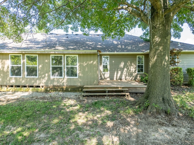 9855 N Route E, Harrisburg, MO 65256 - back of property featuring a wooden deck and roof with shingles