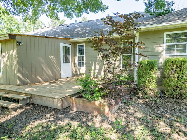 9855 N Route E, Harrisburg, MO 65256 - back of house with roof with shingles and a wooden deck