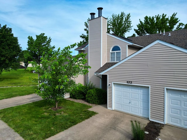 122 W Green Meadows Rd, Columbia, MO 65203 - view of property exterior featuring roof with shingles, a lawn, concrete driveway, and a chimney