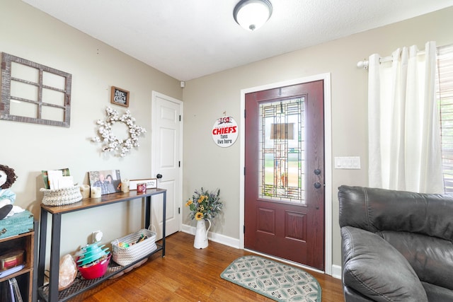 605 Teakwood Ct, Ashland, MO 65010 - entrance foyer with wood finished floors and baseboards