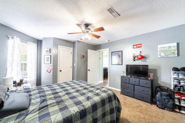 605 Teakwood Ct, Ashland, MO 65010 - bedroom featuring light colored carpet, a textured ceiling, and ceiling fan