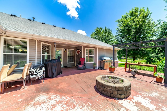 605 Teakwood Ct, Ashland, MO 65010 - view of patio with a fire pit, area for grilling, and a pergola