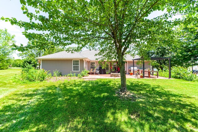 605 Teakwood Ct, Ashland, MO 65010 - rear view of property featuring a patio, a lawn, and a shingled roof