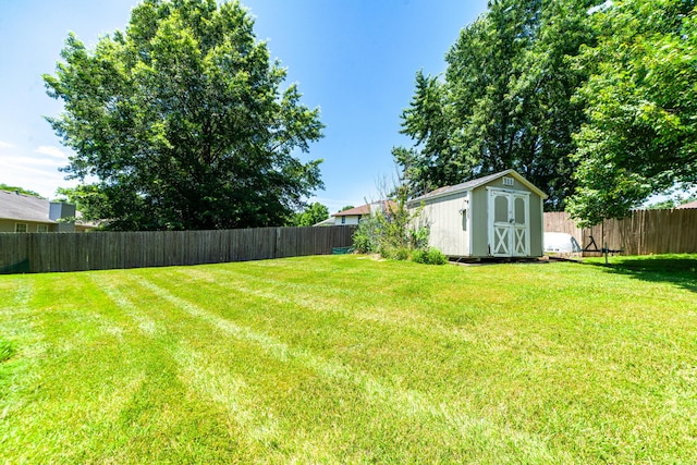 605 Teakwood Ct, Ashland, MO 65010 - fenced backyard featuring a storage shed
