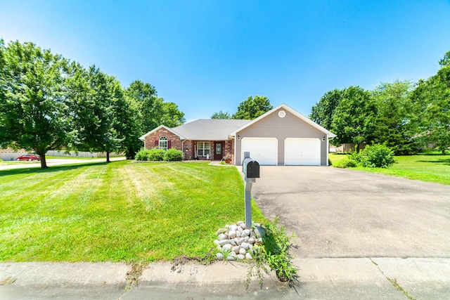 605 Teakwood Ct, Ashland, MO 65010 - ranch-style house featuring an attached garage, a front yard, driveway, and brick siding