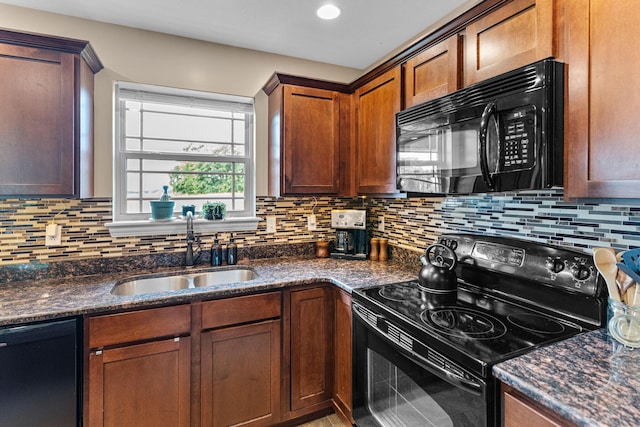 6655 American Setter Dr, Ashland, MO 65010 - kitchen with black appliances, dark stone countertops, and backsplash