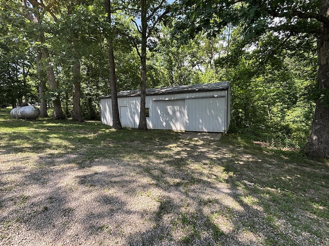 14200 N Yy, Columbia, MO 65202 - view of yard featuring an outbuilding and a pole building