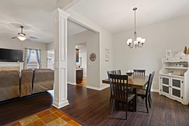 6003 Misty Springs Way, Columbia, MO 65202 - dining space with decorative columns, a chandelier, ceiling fan, and dark wood-type flooring