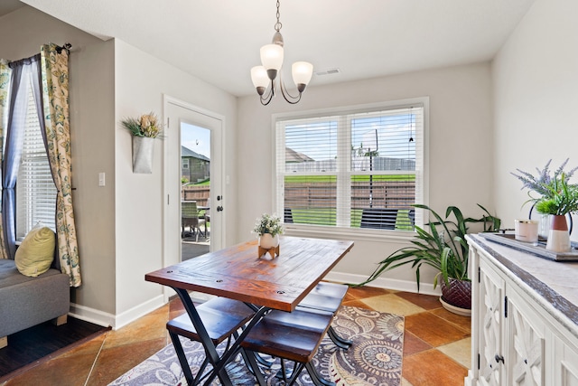 6003 Misty Springs Way, Columbia, MO 65202 - dining room featuring a chandelier and baseboards