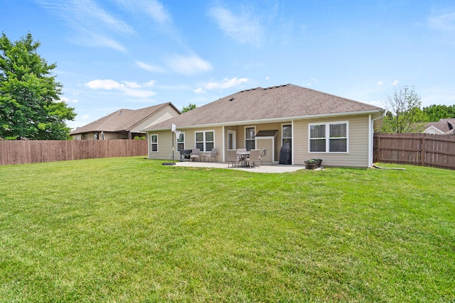 6003 Misty Springs Way, Columbia, MO 65202 - back of property with a fenced backyard and a patio area