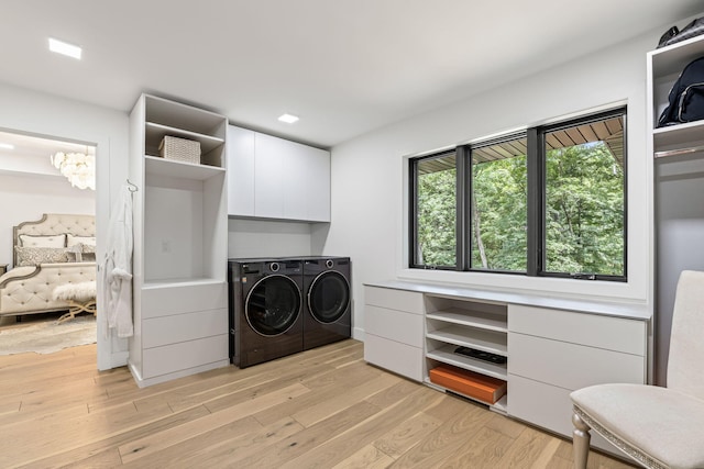 1805 Woodrail Ave, Columbia, MO 65203 - laundry room with washer and dryer, cabinet space, and light wood-style flooring