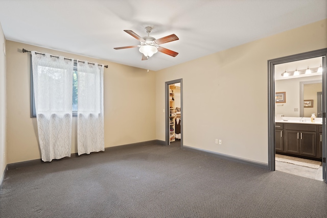 4902 Cochero Ct, Columbia, MO 65203 - spare room featuring ceiling fan and carpet
