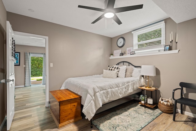 1612 Garden Dr Unit A & B, Columbia, MO 65202 - bedroom with wood finished floors and a ceiling fan