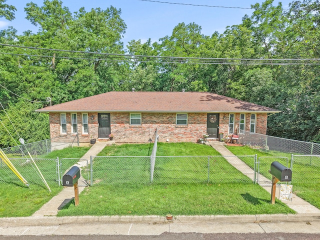 1612 Garden Dr Unit A & B, Columbia, MO 65202 - view of front facade featuring a gate, brick siding, a shingled roof, and a fenced front yard