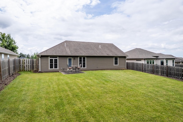 3509 Tuscany, Columbia, MO 65202 - rear view of house with a fenced backyard and a patio area