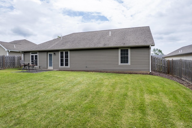 3509 Tuscany, Columbia, MO 65202 - back of house with a fenced backyard, a patio area, and a shingled roof