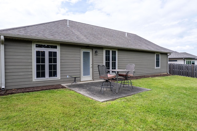 3509 Tuscany, Columbia, MO 65202 - rear view of property featuring roof with shingles and a patio