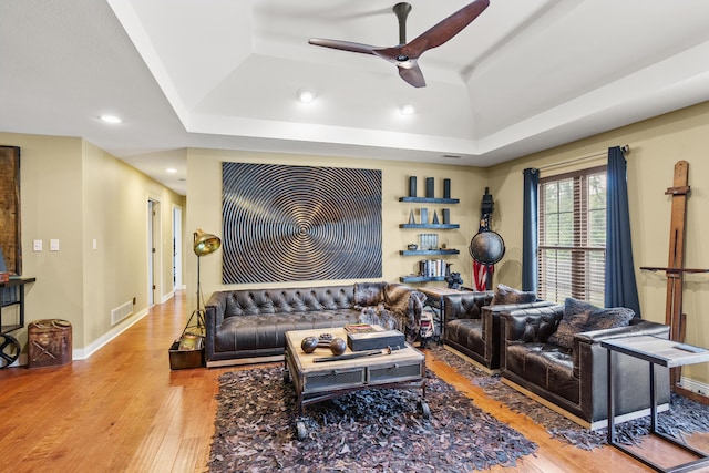3509 Tuscany, Columbia, MO 65202 - living room with hardwood / wood-style flooring, a raised ceiling, a ceiling fan, and recessed lighting