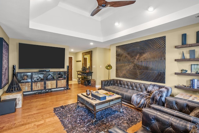 3509 Tuscany, Columbia, MO 65202 - living area featuring a tray ceiling, wood finished floors, ceiling fan, and recessed lighting