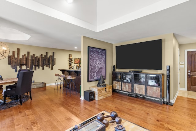 3509 Tuscany, Columbia, MO 65202 - living room with wood finished floors, a chandelier, and recessed lighting