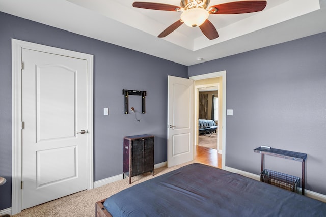 3509 Tuscany, Columbia, MO 65202 - bedroom with carpet, a raised ceiling, and a ceiling fan