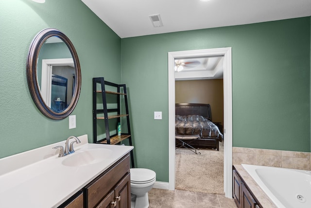 3509 Tuscany, Columbia, MO 65202 - full bath with a tub with jets, vanity, ceiling fan, and ensuite bath