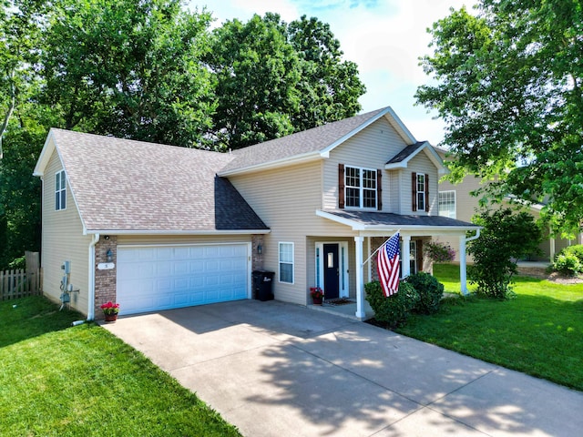 5 Amazon Dr, Columbia, MO 65202 - traditional home with a garage, driveway, a shingled roof, and covered porch