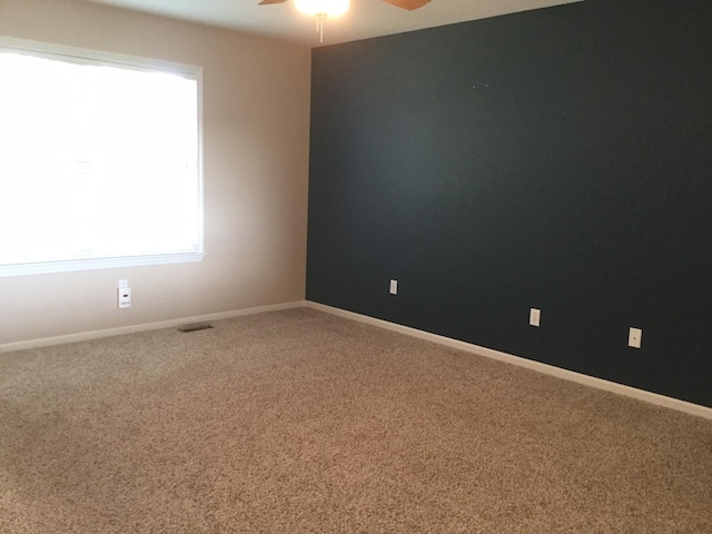 201 Port Way, Columbia, MO 65201 - empty room with ceiling fan and carpet