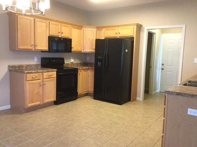 201 Port Way, Columbia, MO 65201 - kitchen featuring black appliances, light brown cabinets, light tile patterned floors, and dark countertops