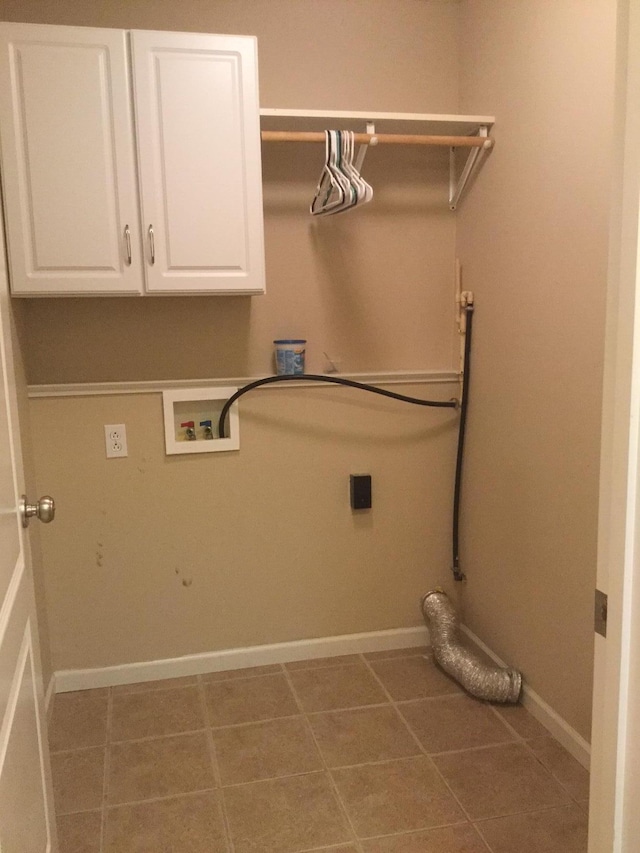 201 Port Way, Columbia, MO 65201 - washroom featuring hookup for a washing machine, cabinet space, tile patterned floors, and hookup for an electric dryer