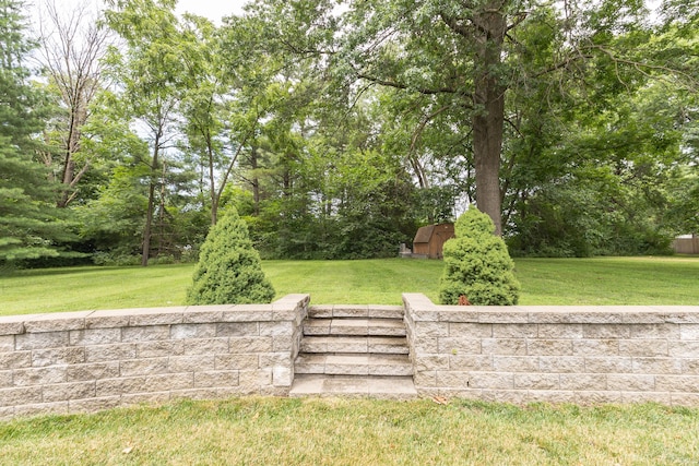 315 W Proctor St, Sturgeon, MO 65284 - view of green lawn featuring a storage shed