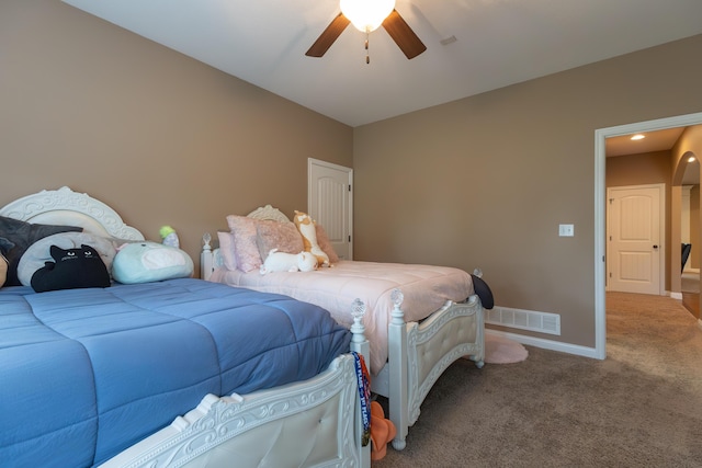 315 W Proctor St, Sturgeon, MO 65284 - bedroom featuring carpet, arched walkways, and ceiling fan