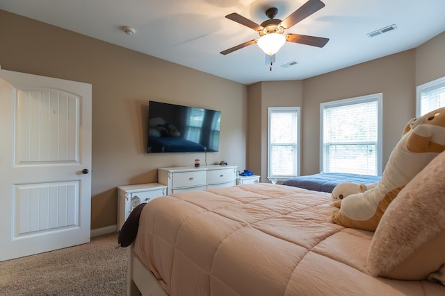 315 W Proctor St, Sturgeon, MO 65284 - bedroom featuring light carpet and a ceiling fan