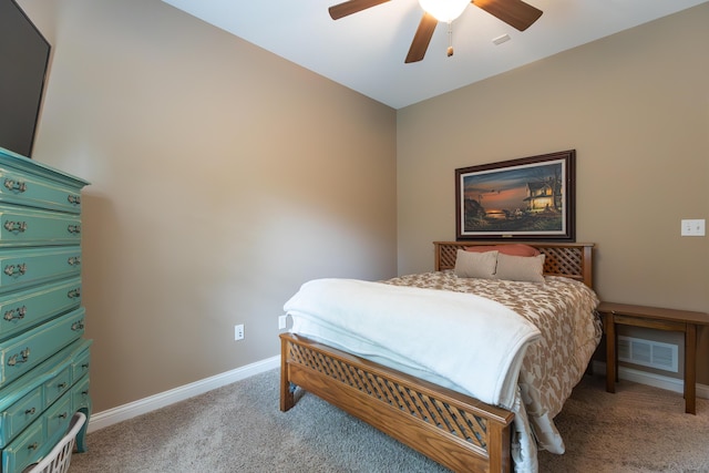 315 W Proctor St, Sturgeon, MO 65284 - carpeted bedroom featuring baseboards and ceiling fan