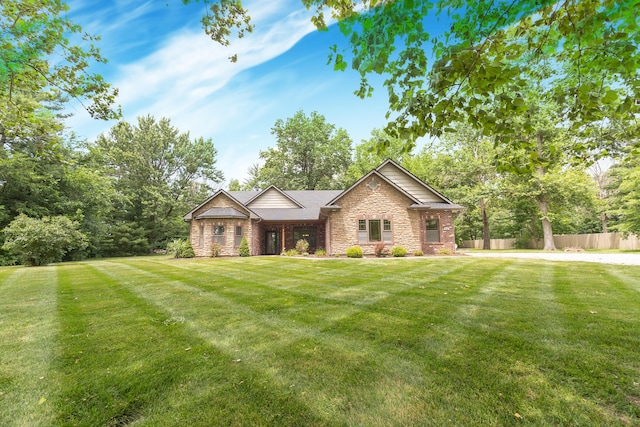 315 W Proctor St, Sturgeon, MO 65284 - view of front of property featuring stone siding and brick siding